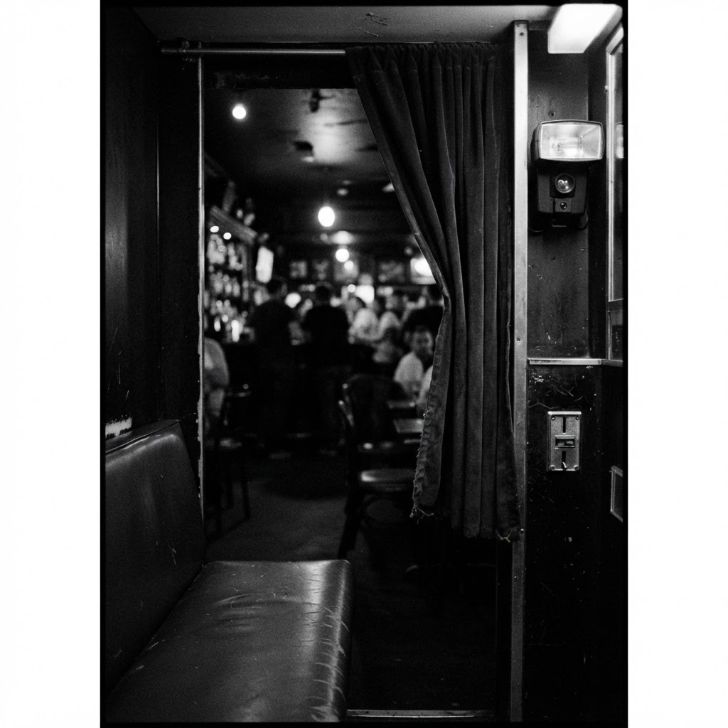 Inside an enclosed photo booth